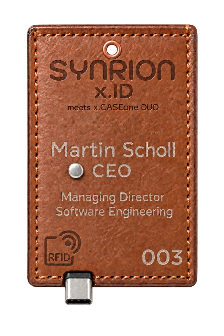 Personalised stitched leather case with RFID symbol, copper-coloured eyelet and USB-C connector.
